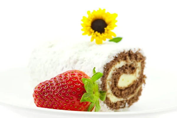 Roll, strawberries and a flower isolated on white — Stock Photo, Image