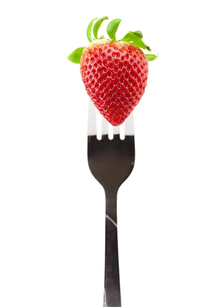 Strawberry on fork isolated on white — Stock Photo, Image