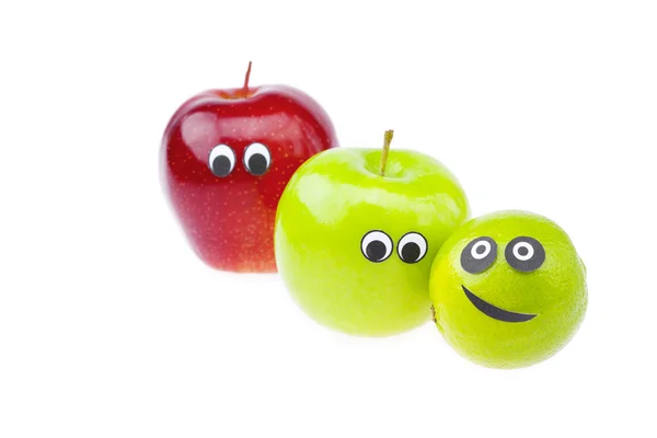 Manzanas con rostros de alegría aislados en blanco — Foto de Stock
