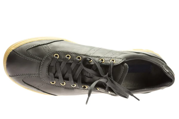 Czarne buty lekkoatletycznego na białym tle — Zdjęcie stockowe