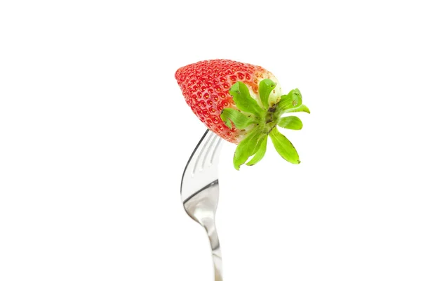 Strawberry on the plug is isolated on a white — Stock Photo, Image