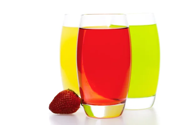 Colored cocktails with strawberries isolated on white — Stock Photo, Image