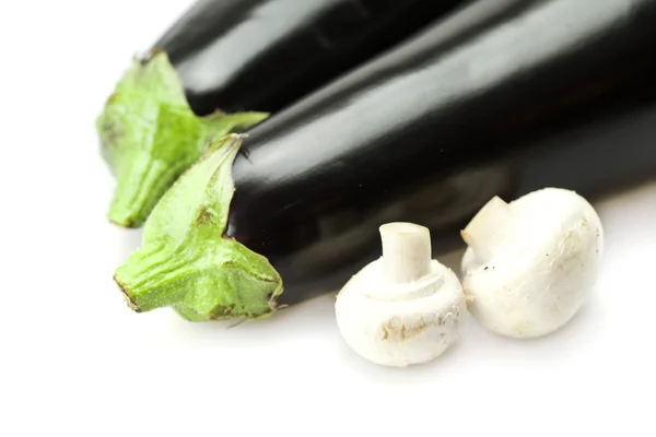 Eggplant and mushrooms isolated on white — Stock Photo, Image