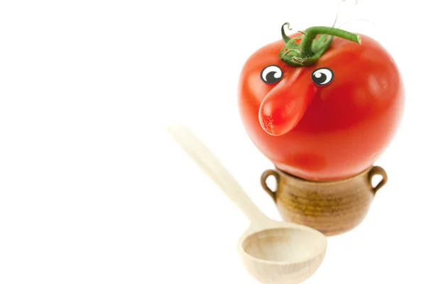 Tomate mit einer Nase und einem kleinen Krug isoliert auf weiß — Stockfoto