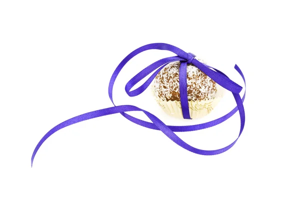 Cake topped with coconut bandaged tape isolated on white — Stock Photo, Image