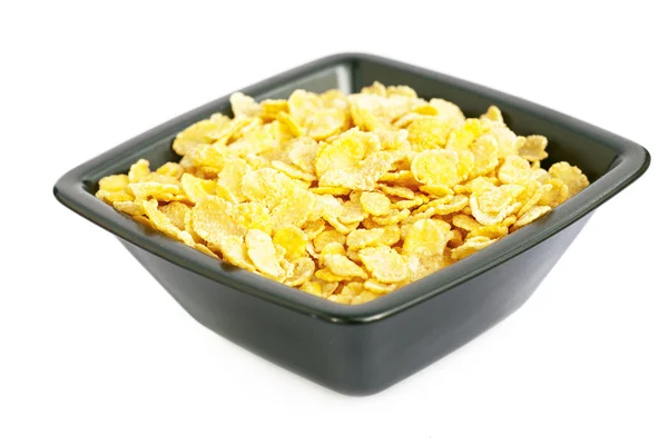 stock image Bowl of cornflakes isolated on white