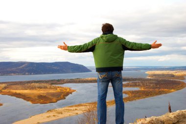 Man standing on the river clipart