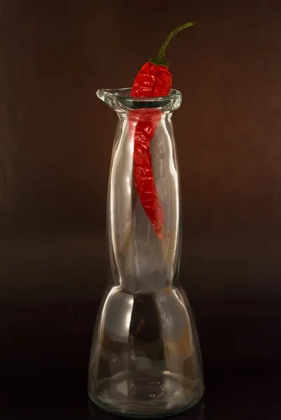 Peperoncino in una bottiglia di vetro — Foto Stock