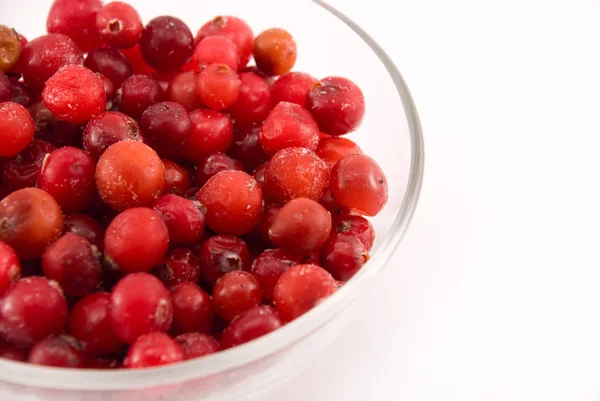 Stock image Glass bowl with cranberries isolated on white