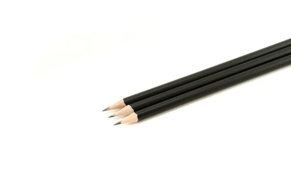 Lápiz negro aislado en blanco — Foto de Stock