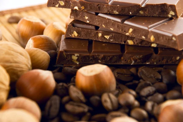 Nuts and chocolate — Stock Photo, Image