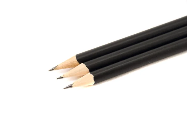 Black pencil isolated on white — Stock Photo, Image