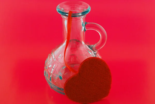 Cam şişe ve kalp — Stok fotoğraf