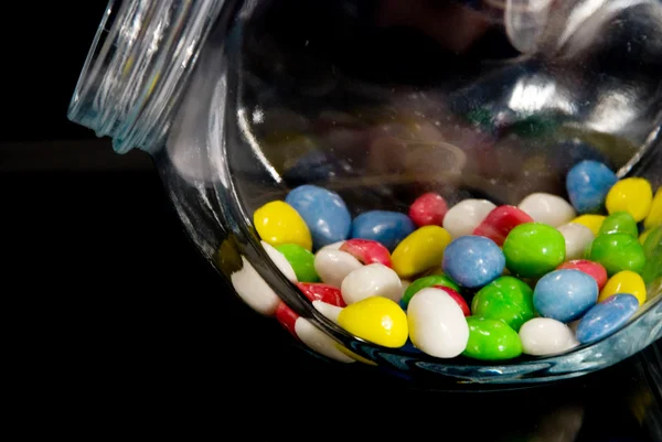 Bonbons dans un pot en verre — Photo