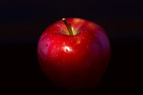 Jablko na černém pozadí Stock Obrázky
