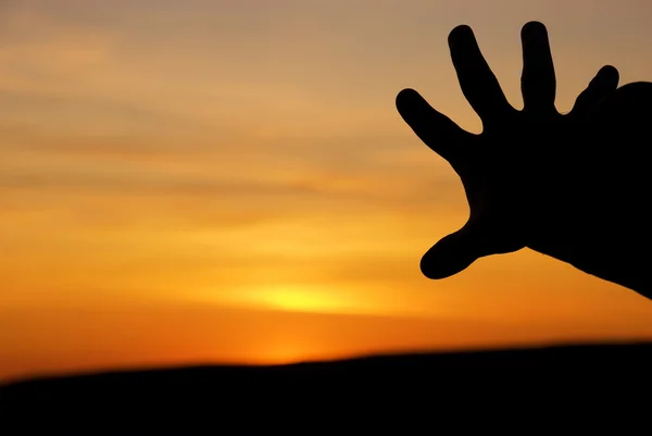 Hand against the sky — Stock Photo, Image