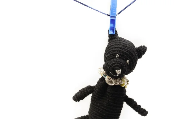 Bear hanging on pegs — Stock Photo, Image