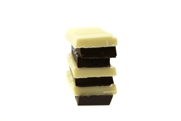 Chocolate negro y blanco aislado en blanco — Foto de Stock