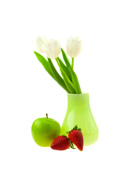 Vase with tulips apple and strawberry isolated on white — Stock Photo, Image