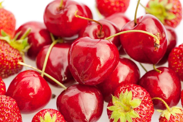 Bakgrund av körsbär och jordgubbe — Stockfoto
