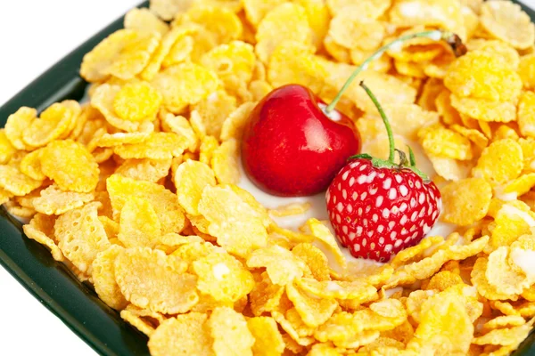 Bowl of cornflakes cherry and strawberry isolated on white — Stock Photo, Image