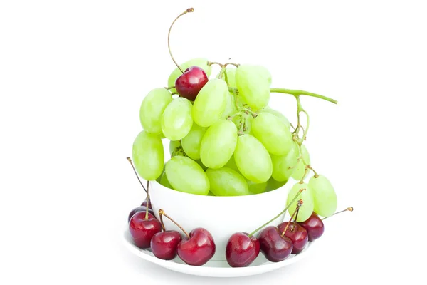 Grapes cherry in the cup is isolated on white — Stock Photo, Image