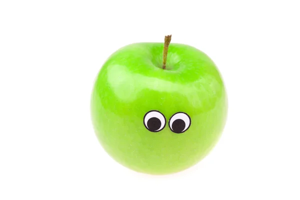 Яблоки с глазами и лицами, изолированными на белом — стоковое фото
