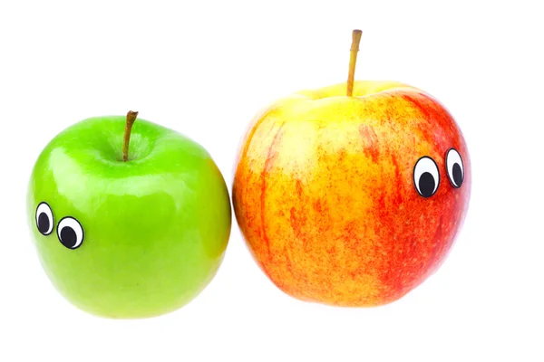 Manzanas con ojos y rostros aislados en blanco —  Fotos de Stock