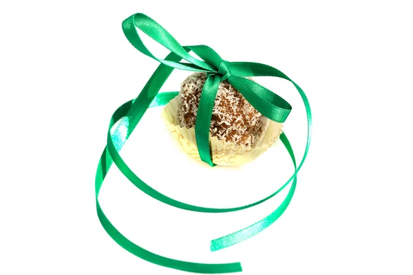 Cake with coconut tied with ribbon isolated on white — Stock Photo, Image