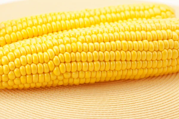 Corn lying on a mat — Stock Photo, Image