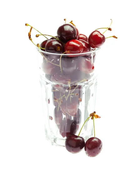 Cherry in a glass isolated on white — Stock Photo, Image