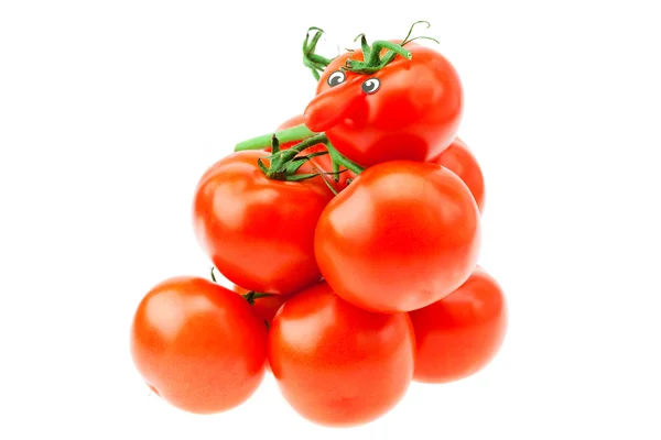 Rajče s očima na hromadě rajčete izolovaných na bílém — Stock fotografie