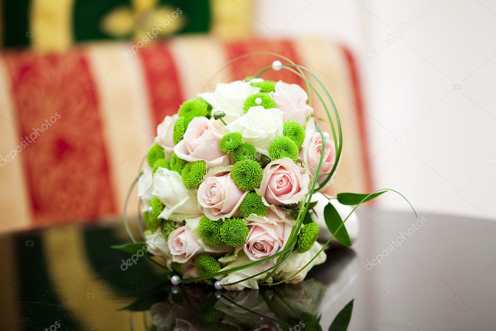 Beautiful bridal bouquet lying on the table