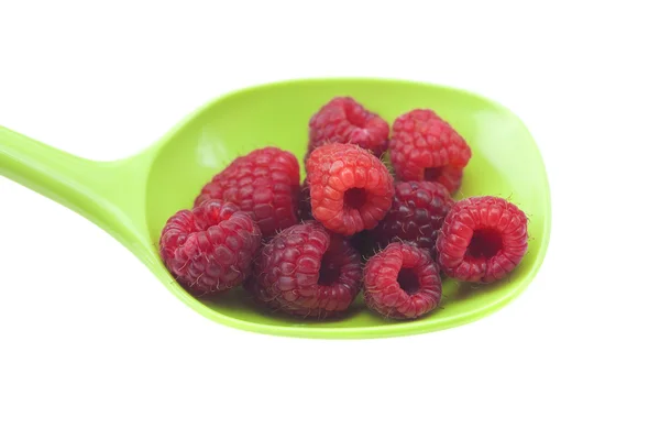 Raspberries in a spoon isolated on white — Stock Photo, Image