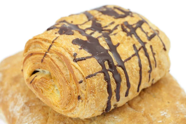 Pan y rollo con chocolate aislado en blanco —  Fotos de Stock