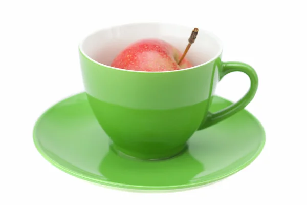 Cup, schotel en appels geïsoleerd op wit — Stockfoto