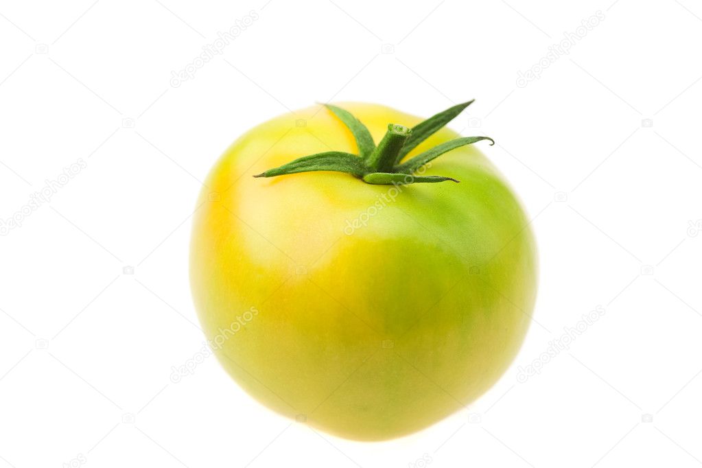 Green tomato isolated on white