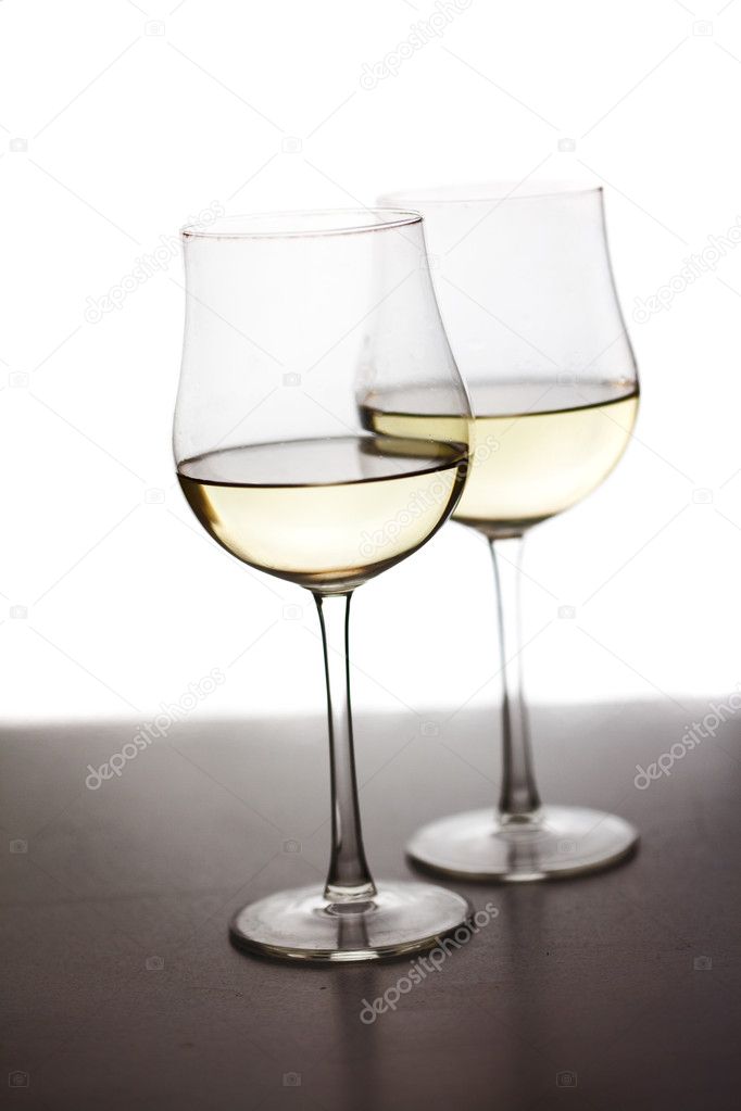 Glass of wine on a white background