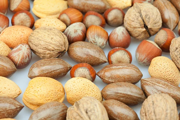 Фон различных видов орехов — стоковое фото
