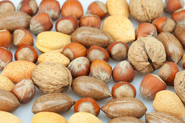 Achtergrond van verschillende soorten noten — Stockfoto