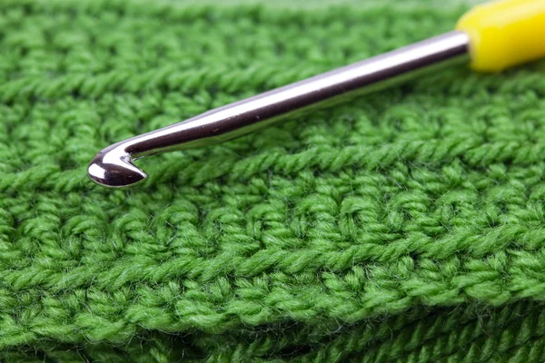 Crochet crochet et fond pièce tricotée — Photo