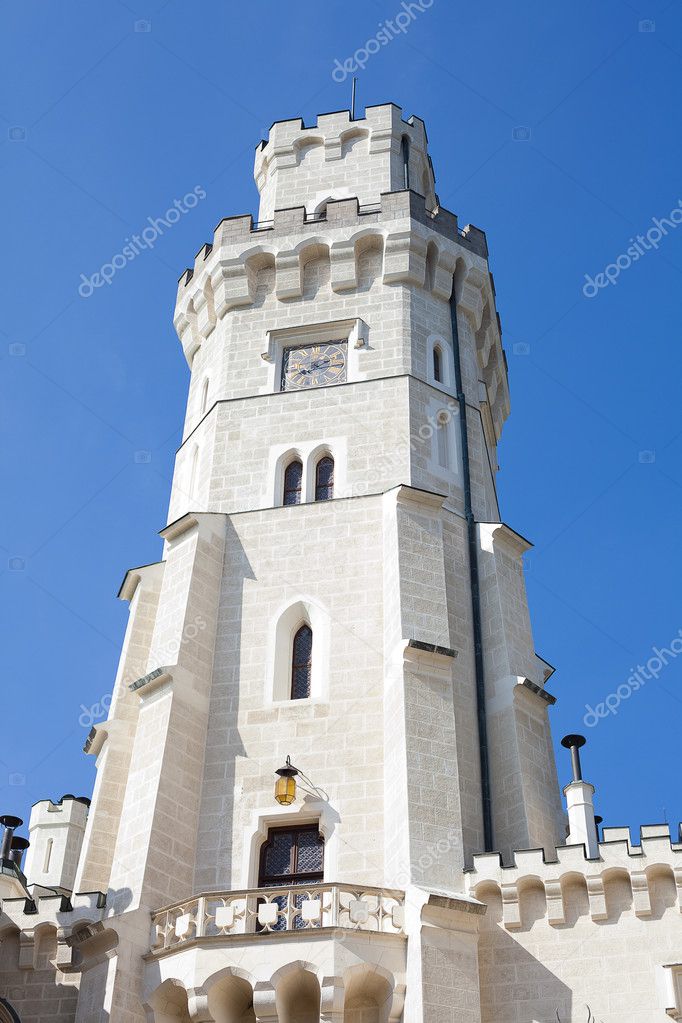 Castle tower against the blue sky