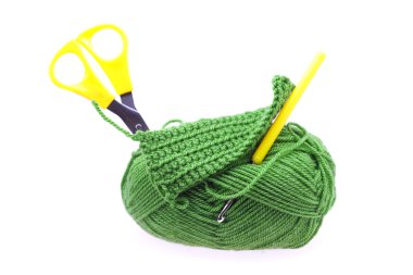 Skein of wool with scissors and crochet hooks isolated on white clipart