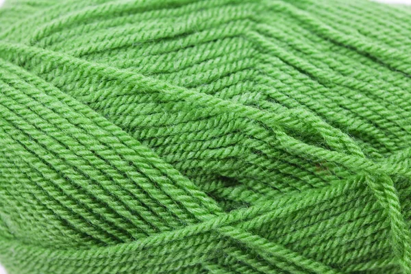 Skein of wool and knitted piece background — Stock Photo, Image