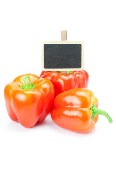 stock image Red pepper and board isolated on white