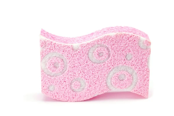 Розовая губка, выделенная на белом — стоковое фото