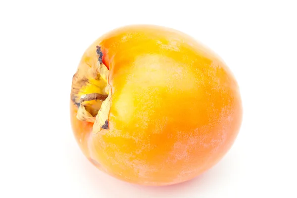 Pomarańczowy persimmon na białym tle — Zdjęcie stockowe