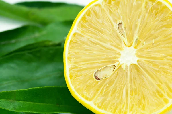 Lemon with green leaf isolated on white — Stock Photo, Image