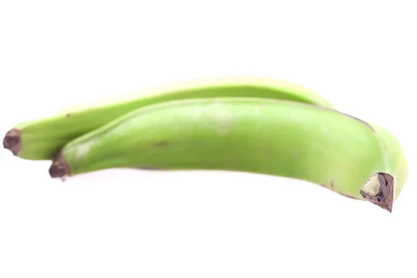 Velké zelené banány izolovaných na bílém — Stock fotografie