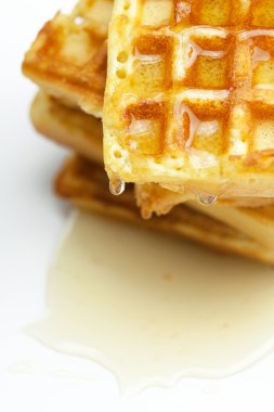 Delicious Belgian waffles is isolated on white